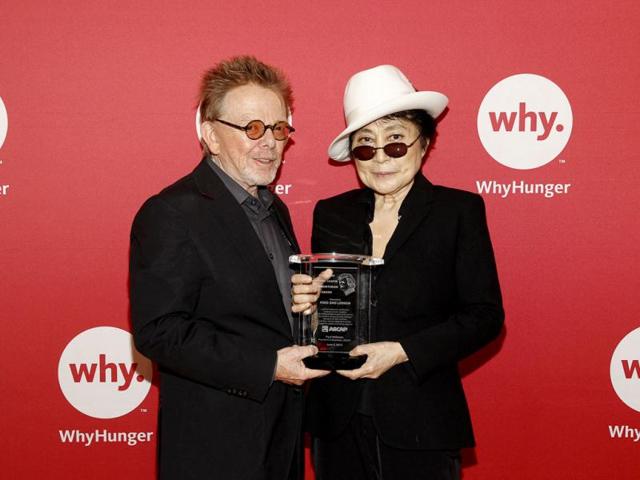 Legendary artist and activist Yoko Ono Lennon is presented the ASCAP Harry Chapin Humanitarian Award by ASCAP President Paul Williams at the WhyHunger Chapin Awards in New York. Yoko Ono Lennon is the vital force behind WhyHunger’s “Imagine There’s No Hunger” campaign to combat children hunger in 19 countries. (AP)