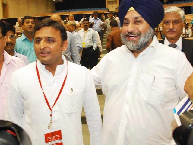 Punjab deputy chief minister Sukhbir Singh Badal meeting Uttar Pradesh chief minister Akhilesh Yadav during the chief minister's conference on internal security in New Delhi. UNI Photo