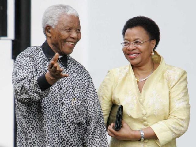 File photo: Former South African president Nelson Mandela and his wife, Graca Machel attend the unveiling of his statue in Parliament square on August 29, 2007 in London, England. Getty Images/Gareth Cattermole