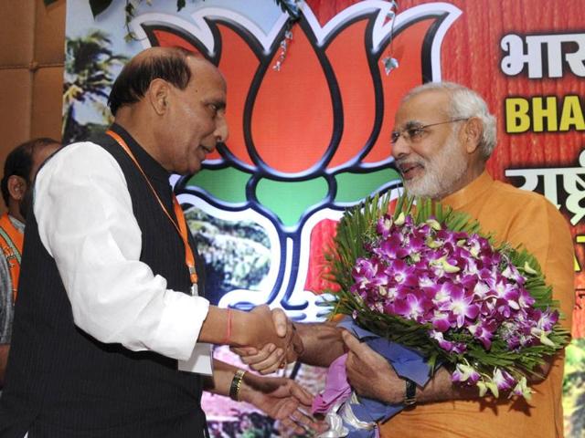 BJP strongman Narendra Modi with BJP president Rajnath Singh during the BJP’s National Executive at Panaji, Goa. AP Photo