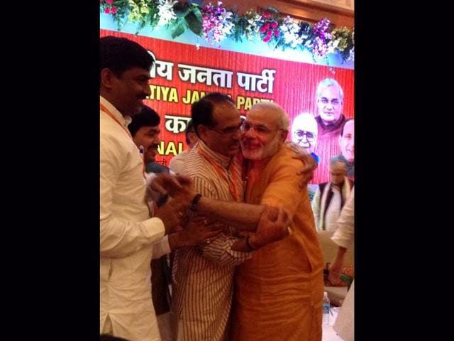 Gujarat CM Narendra Modi with Madhya Pradesh chief minister Shivraj Singh Chauhan after his anointment as BJP election campaign committee chief for 2014 polls. HT photo