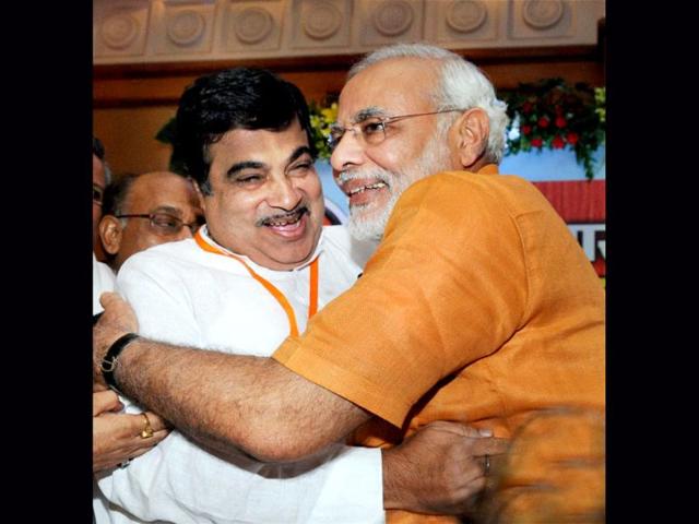 BJP strongman Narendra Modi being greeted by former BJP president Nitin Gadkari after being anointed chairman of BJP poll panel for 2014 polls. PTI