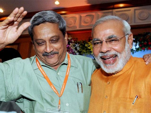 BJP poll panel chief Narendra Modi with Goa chief minister Manohar Parrikar at the party's National Executive meeting in Panaji, Goa. PTI Photo