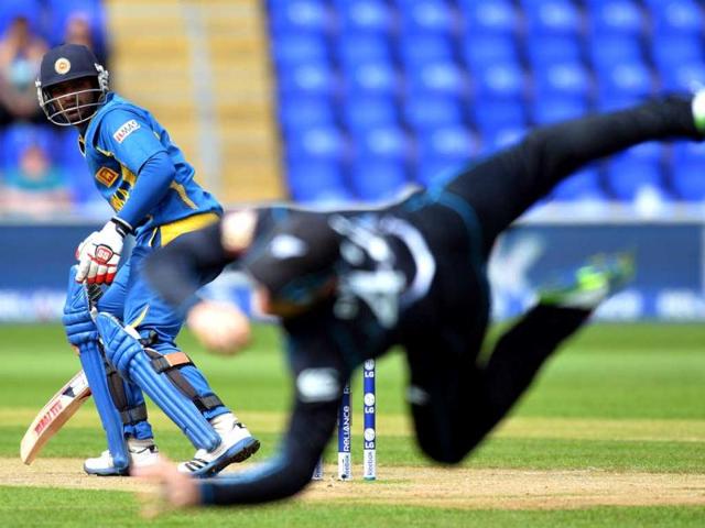 Nathan McCullum (R) catches Sri Lanka's Kusal Perera off the first ball during the 2013 ICC Champions Trophy cricket match between Sri Lanka and New Zealand at The Cardiff Wales Stadium in Cardiff, Wales. AFP Nathan McCullum (R) catches Sri Lanka's Kusal Perera off the first ball during the 2013 ICC Champions Trophy cricket match between Sri Lanka and New Zealand at The Cardiff Wales Stadium in Cardiff, Wales. AFP