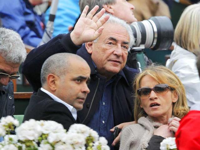 Former International Monetary Fund (IMF) chief Dominique Strauss-Kahn (C) and Myriam L'Aouffir (R) watch the men's singles final match between Rafael Nadal and David Ferrer at the French Open tennis tournament at the Roland Garros stadium in Paris. Reuters Former International Monetary Fund (IMF) chief Dominique Strauss-Kahn (C) and Myriam L'Aouffir (R) watch the men's singles final match between Rafael Nadal and David Ferrer at the French Open tennis tournament at the Roland Garros stadium in Paris. Reuters