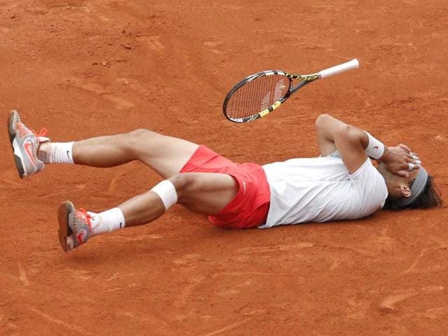 Rafael Nadal celebrates winning against David Ferrer in three sets 6-3, 6-2, 6-3, in the final of the French Open tennis tournament, at Roland Garros stadium in Paris. AP Photo Rafael Nadal celebrates winning against David Ferrer in three sets 6-3, 6-2, 6-3, in the final of the French Open tennis tournament, at Roland Garros stadium in Paris. AP Photo
