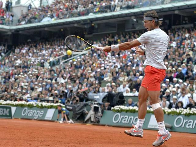 Rafael Nadal hits a forehand to David Ferrer during the 2013 French Open final at the Roland Garros stadium in Paris. AFP Rafael Nadal hits a forehand to David Ferrer during the 2013 French Open final at the Roland Garros stadium in Paris. AFP