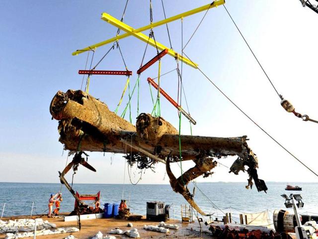 A Dornier 17 German bomber aircraft which crashed into the sea during World War II is raised by a salvage crew off the coast of Deal, southeast England, in this handout photo by the Royal Air Force Museum. The bomber was lifted after spending over 70 years on the Goodwin Sands seabed, in an exercise overseen by the Royal Air Force Museum and funded by donations. It was shot down during the Battle of Britain on August 26, 1940. REUTERS