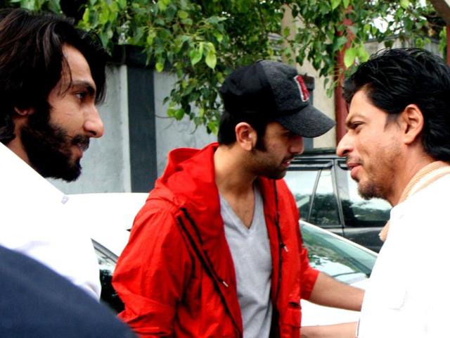 Shah Rukh Khan is seen with two young actors - Ranveer Singh and Ranbir Kapoor. (PTI Photo)