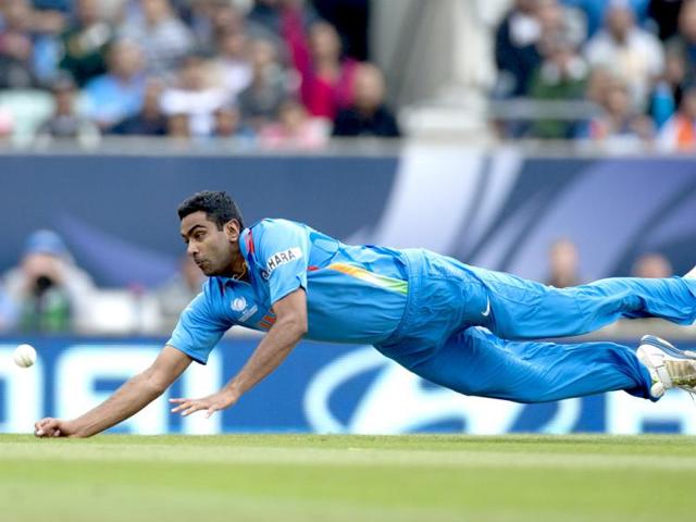 Ravichandran Ashwin fails to take a catch off his own bowling during the ICC Champions Trophy match with West Indies in London. AP