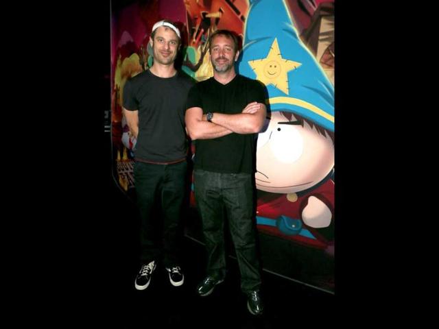 Matt Stone (left) and Trey Parker visit the Ubisoft booth to discuss "South Park: The Stick of Truth" at E3 in Los Angeles. (AP)