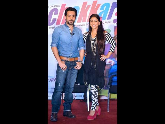 Actors Emraan Hashmi (L) and Vidya Balan attend the promotion of upcoming Hindi film Ghanchakkar in Mumbai on June 12, 2013. (AFP PHOTO)