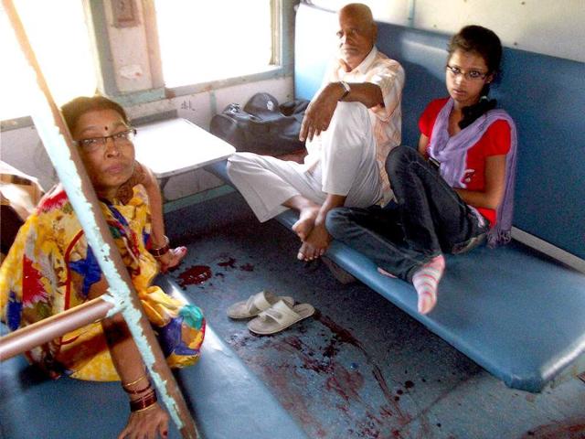 Passengers of Dhanbad-Patna Intercity Express which was attacked by suspected Maoists near Kundhar halt in Jamui district of Bihar. PTI