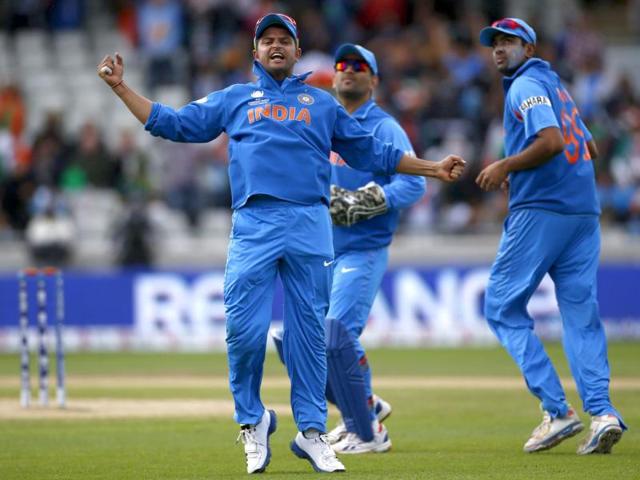 Suresh Raina celebrates the wicket of Pakistan's Nasir Jamshed during their ICC Champions Trophy at Edgbaston ground in Birmingham. Reuters