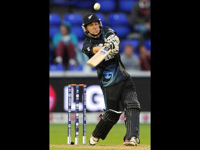 Nathan McCullum bats during the 2013 ICC Champions Trophy cricket match between England and New Zealand at the Cardiff Wales Stadium in Cardiff, south Wales. AFP Photo