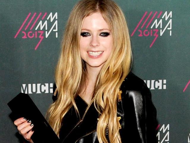 Avril-Lavigne-poses-in-the-press-room-at-the-2013-MuchMusic-Video-Awards-at-Bell-Media-Headquarters-in-Toronto-Canada---AFP