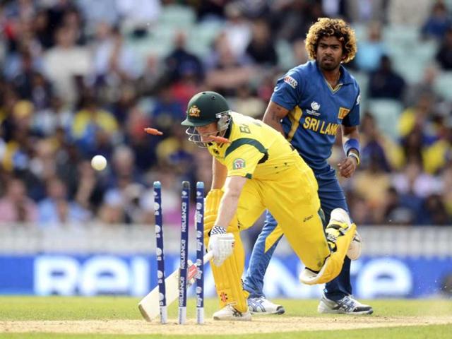 Lasith Malinga (right) looks on as Australia's George Bailey is run out during the ICC Champions Trophy group A match at The Oval cricket ground, London. Reuters