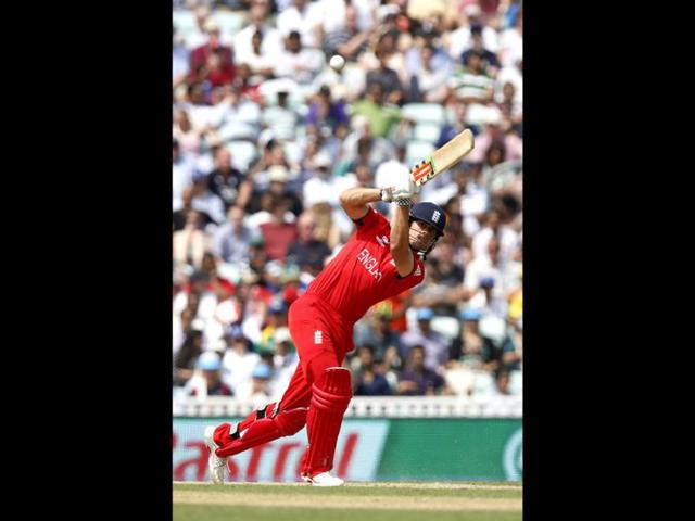 England's Alastair Cook plays a shot off the bowling of South Africa's Jean-Paul Duminy during their ICC Champions Trophy semifinal match at The Oval in London. AP Photo