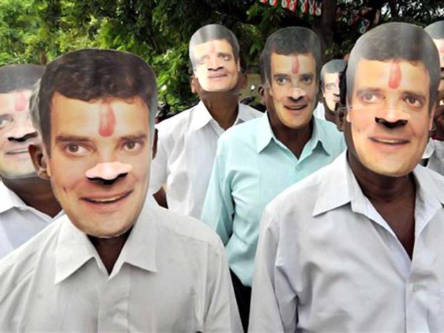 Congress workers wear party vice president Rahul Gandhi's masks to celebrate his 43rd birthday in Coimbatore. (PTI Photo)