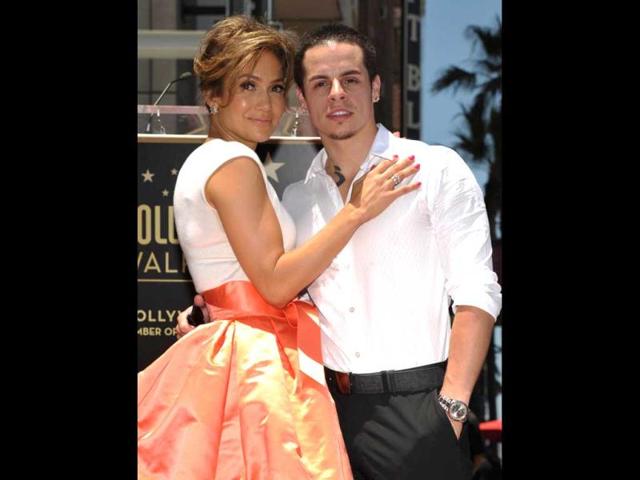 Actor Keenen Ivory Wayans, rapper Pitbull and Jane Fonda sang her praises at the event on June 20, 2013 that was attended by Lopez's boyfriend, Casper Smart (right), and twins Max and Emme. 