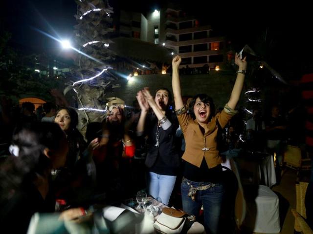 People celebrate Palestinian singer Mohammed Assaf winning "Arab Idol" in Gaza city. The 22-year-old Assaf, from the Gaza Strip, was named the winner of "Arab Idol" in a TV talent contest in Beirut. (AFP)