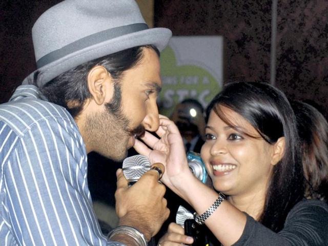 Ranveer Singh amuses a fan during promotion of Lootera in Kolkata on Saturday. (PTI Photo)