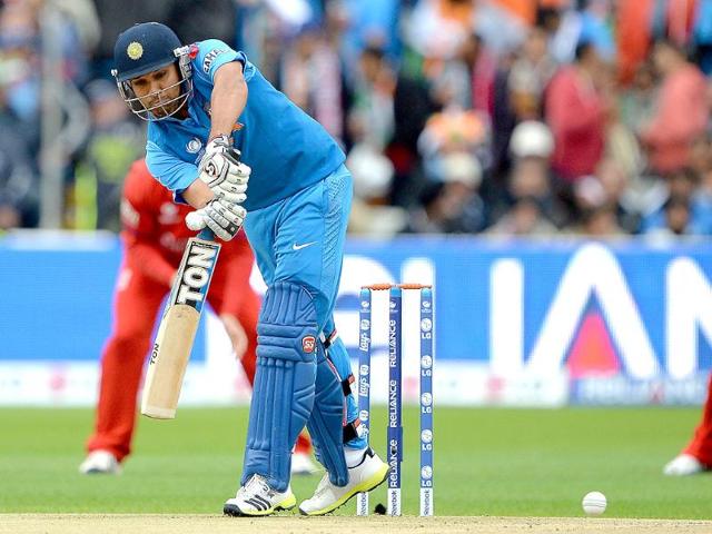 Rohit Sharma plays a shot during 2013 ICC Champions Trophy final match between England and India at Edgbaston in Birmingham. AFP