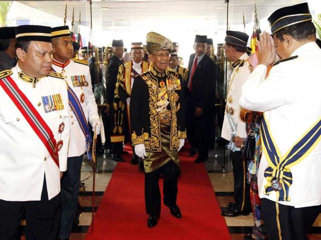 Malaysia's King Abdul Halim Mu'adzam Shah (C) arrives for the opening of the parliament sitting at Parliament House in Kuala Lumpur. Reuters