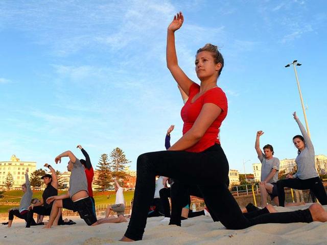 Boot-camp-enthusiasts-work-out-on-Sydney-s-iconic-Bondi-Beach-Photo-AFP-William-West