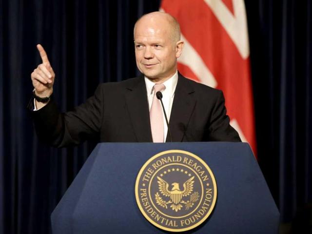 British Foreign Secretary William Hague speaks at the Ronald Reagan Presidential Library. Hague defended his country's intelligence-sharing ties with the United States as governments in both countries face criticism about snooping on citizens. (AP)
