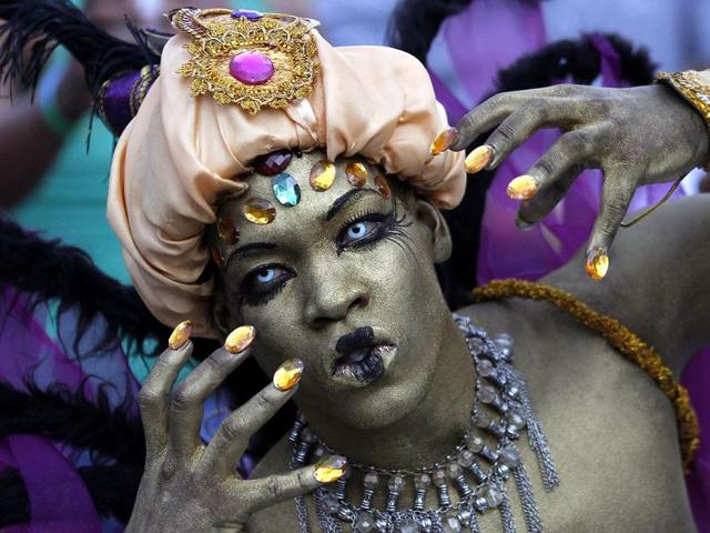 A reveller who is dressed up takes part in the annual Gay Pride Parade in Panama City. Reuters
