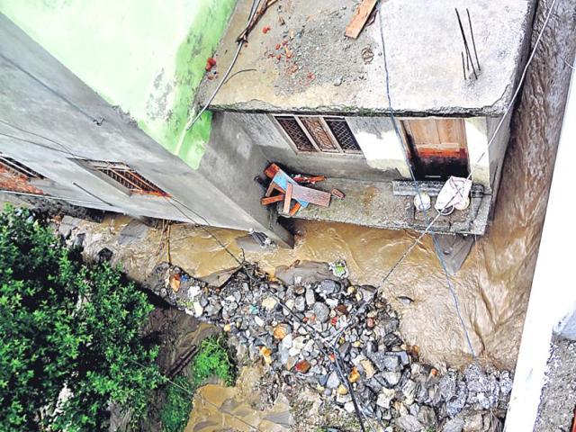 Flood waters as seen from the hotel balcony in Dharali. (HT Photo/Prasad Nichenametla)