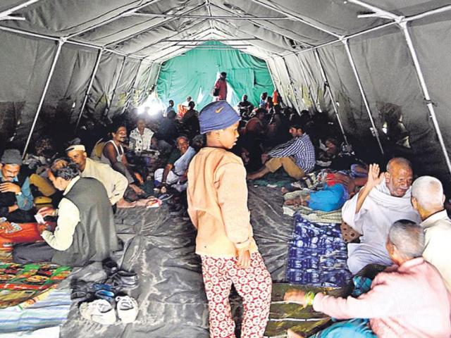 Army set up tents in the local school for pilgrims trickling in from Gangotri on foot. (HT Photo/Prasad Nichenametla)