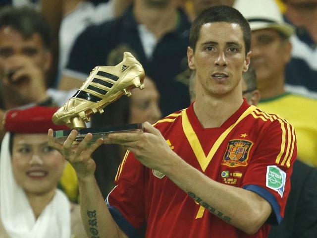 Spain's Fernando Torres holds the golden boot award as best scorer of the event after Spain lost the Confederations Cup final to Brazil in Rio de Janeiro, Brazil. AP