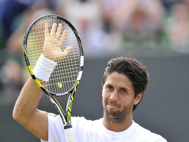 Fernando Verdasco celebrates beating Kenny De Schepper during their fourth round men's singles match at the Wimbledon Championships. AFP Photo