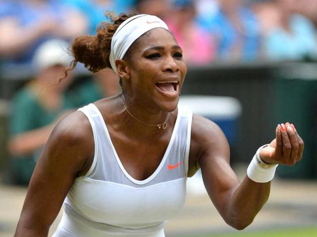 Serena Williams reacts after crashing out of the Wimbledon Championships tennis tournament at the All England Club in Wimbledon, London. AFP Photo
