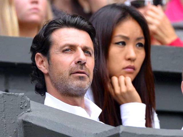 Patrick Mouratoglou, the coach of Serena Williams, sits on Centre Court, during her match with Sabine Lisicki at Wimbledon. Reuters