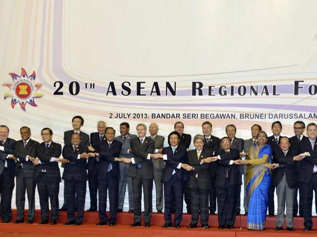 Foreign ministers and secretary-generals of the Association of Southeast Asian Nations (ASEAN) and their dialogue partners pose for a group photo during the 20th ASEAN Regional Forum in Bandar Seri Begawan. (Reuters)