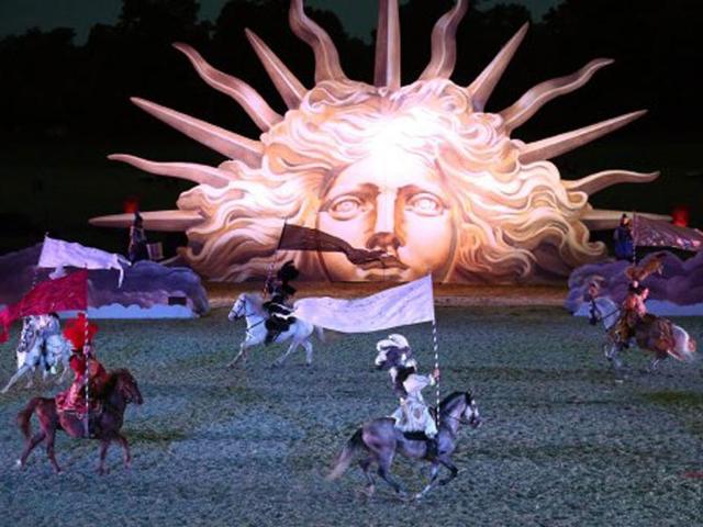 Riders symbolizing mythological stages, with foreign princes willing to conquer Apollo at Le Grand Carrousel Royal in Versailles, Paris, during the show "Les Chevaux du soleil" (Sun's horses). AFP