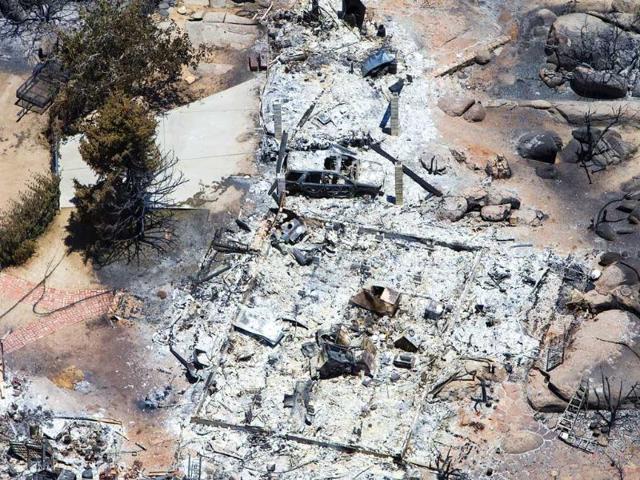 This aerial photo shows Yarnell, Arizona in the aftermath of the Yarnell Hill Fire that claimed the lives of 19 members of an elite firefighting crew. AP Photo