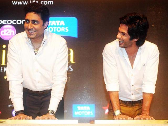 Abhishek Bachchan and Shahid Kapoor create their handprints onto a special cast during the opening press conference of the 14th IIFA at The Venetian hotel in Macau on July 4. (AFP Photo)