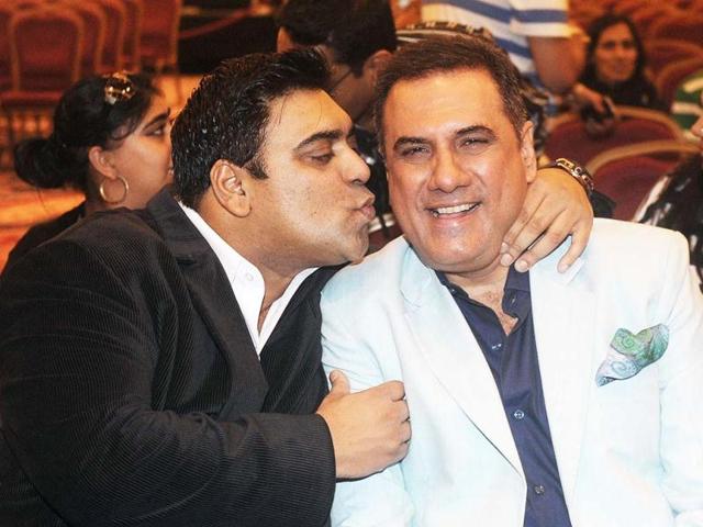 Actor Ram Kapoor could not help but kiss Boman Irani. The makers of Santa Banta - starring Ram Kapoor and Boman Irani held a press conference at Venetian Macao after IIFA 2013 raised its curtains. (AFP Photo)