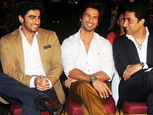IIFA 2013 opened on Thursday in the presence of top Bollywood stars. At the opening press conference of the 14th IIFA, shutterbugs captured several actors bonding. Arjun Kapoor seems to be having fun with Shahid Kapoor and Abhishek Bachchan at The Venetian hotel in Macau on July 4, 2013. (AFP Photo)