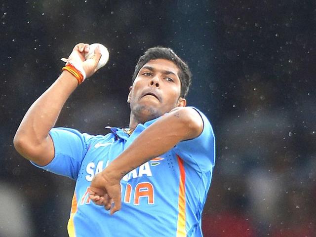 Umesh Yadav delivers a ball during the fourth match of the Tri-nation series between India and West Indies at the Queen's Park Oval in Port of Spain. (AFP)