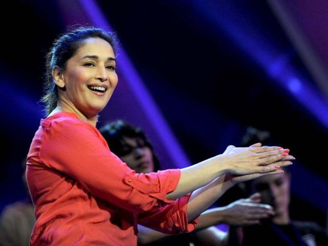 Madhuri spreads her smile around. (AFP Photo)