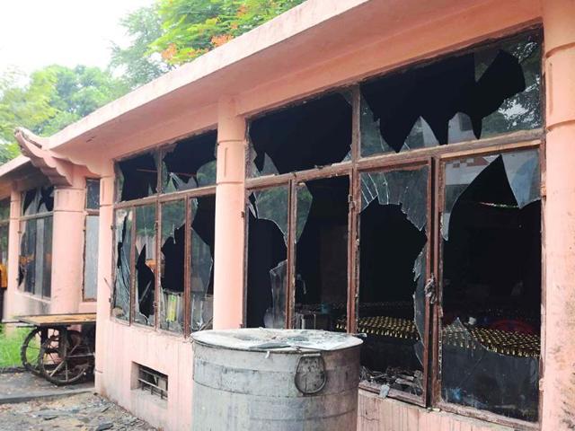 This image shows broken windows at the Bodh Gaya Buddhist temple complex after 9 low-intensity blasts took place injuring two people. AFP