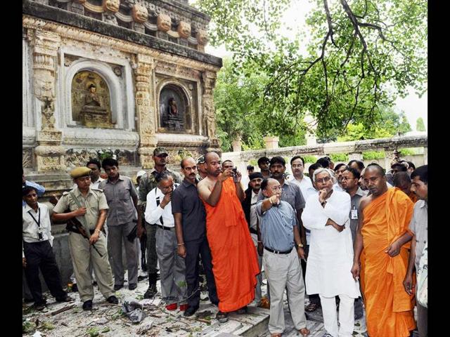 Bihar chief minister Nitish Kumar visits the Mahabodhi Temple after 9 blasts took place in Budh temples at Bodh Gaya. PTI