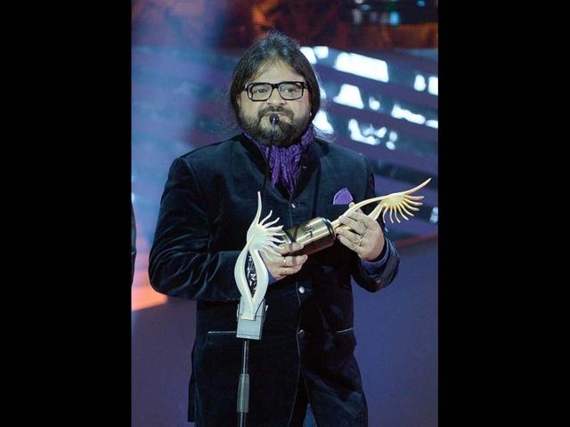 Facing the music: Music composer Pritam Chakravarty speaks after winning the IIFA award for Best Music Director for Barfi!