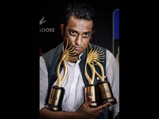 Got his hands full! Director Anurag Basu holds the best director, best actor (on behalf of absent Ranbir Kapoor) and the best story trophies for his film Barfi!