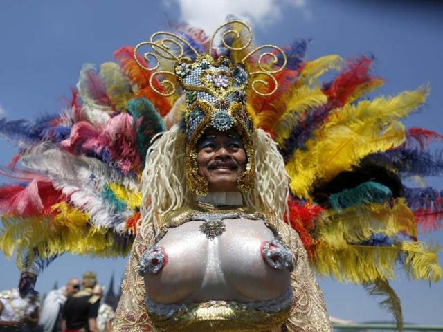 A reveller takes part in the Christopher Street Day parade in Cologne as they take part in the annual parade in Cologne to demonstrate for the rights of all lesbian, gay, bisexual, transgender and transsexual (LGBT) people. Reuters